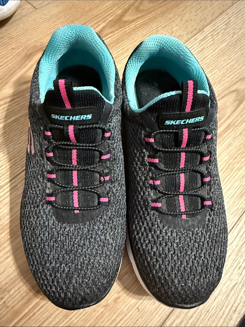 Skechers Women's Black Knit Slip-On Sneakers with Teal Lining and Pink Accents